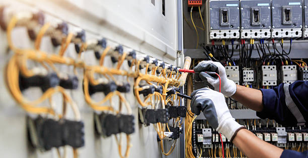 Professional Electrician technician working in Miami Shores, FL